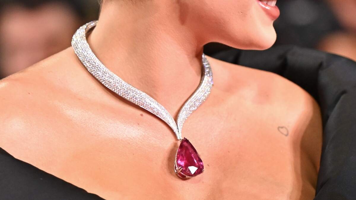 Actor Bella Thorne wears black dress with a diamond and rubellite Chopard necklace on the red carpet at Cannes 2024