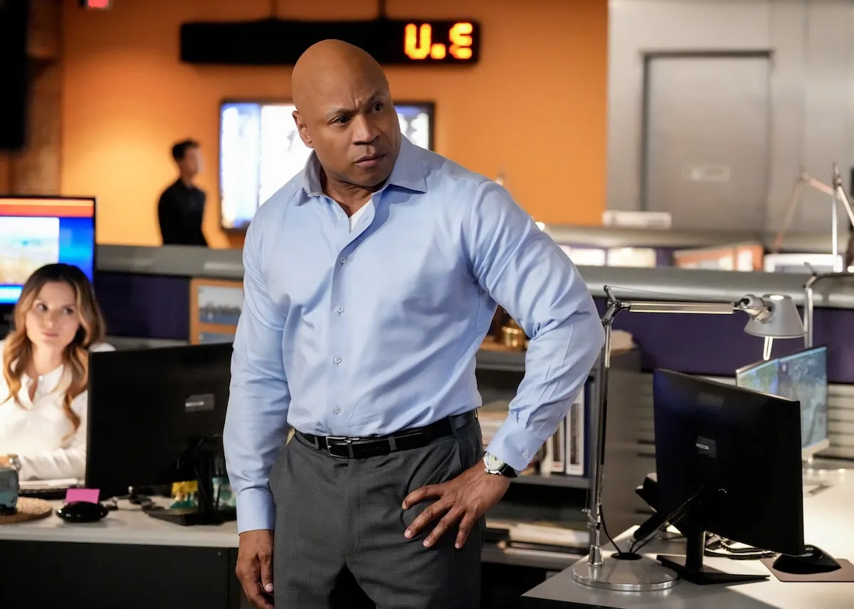 LL Cool J in a blue button down shirt in the NCIS office