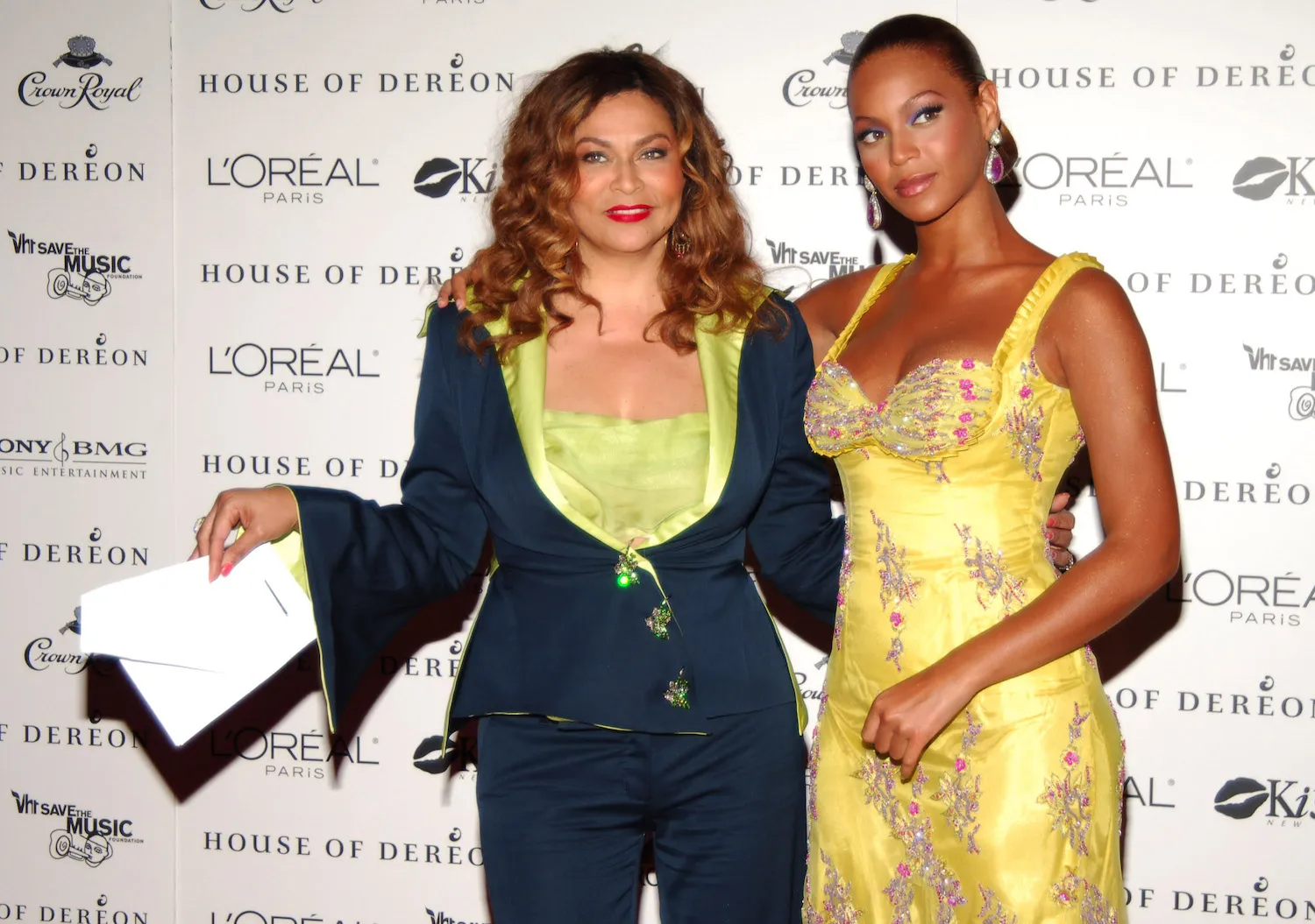 Tina Knowles and Beyoncé Knowles-Carter posing next to each other