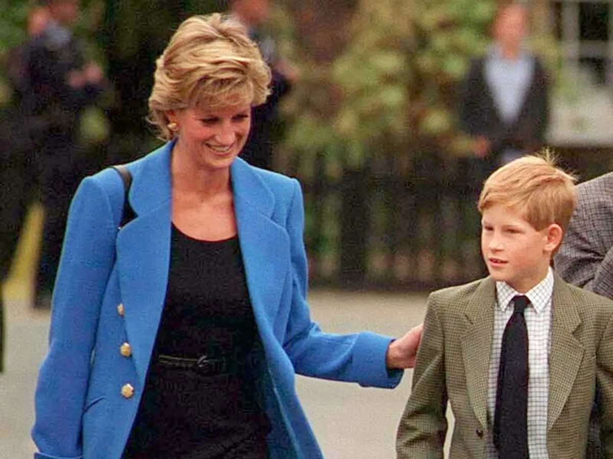 Prince Harry walking with his mother, Princess Diana, circa (1995)